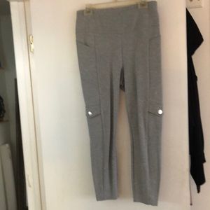 Cute gray leggings with a cargo detail and dropped waist.